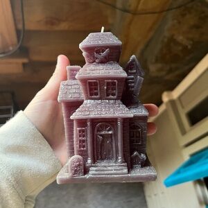 Spooky house candle